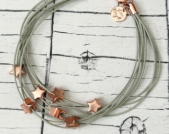 Bracciale multifilo a stella in grigio e oro rosa