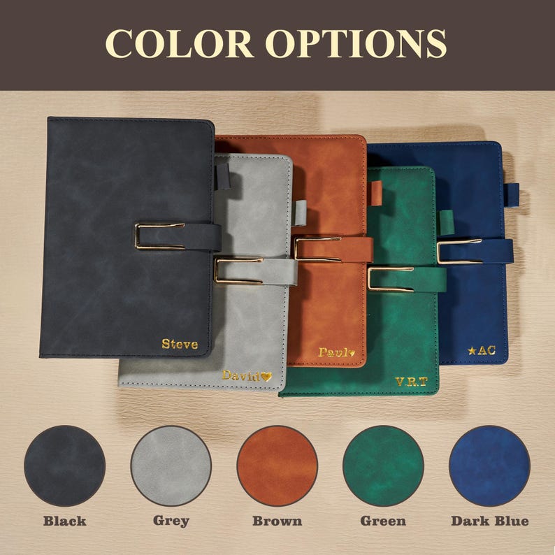 May include: A selection of personalized notebooks in black, grey, brown, green, and dark blue. Each notebook features a gold-colored clasp and is embossed with a name or initials. The text "COLOR OPTIONS" is at the top, with color swatches below.