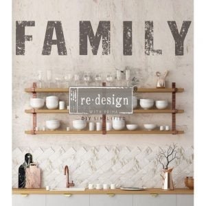 May include: A distressed grey vinyl wall decal with the word "FAMILY" in large, bold letters. The decal is applied to a white wall in a kitchen setting.