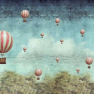 May include: A blue sky with white clouds and multiple red and white striped hot air balloons floating in the sky.