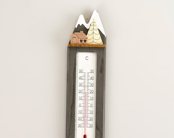 Termômetro do cume coberto de neve