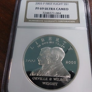 2003-P First Flight Silver Dollar PF 69 Ultra Cameo NGc
