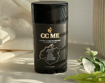 May include: A black deodorant stick with gold lettering that reads "CC ME Crevice Cream Deodorant for every inch of your body". The deodorant is made with all-natural ingredients and is free of aluminum, baking soda, and parabens. It is also vegan and provides 24-hour protection.