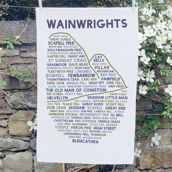 Wainwrights tea towel featuring names of Lake District fells, including Scafell Pike, Blencathra, Skiddaw and Helvellyn. Made in the UK