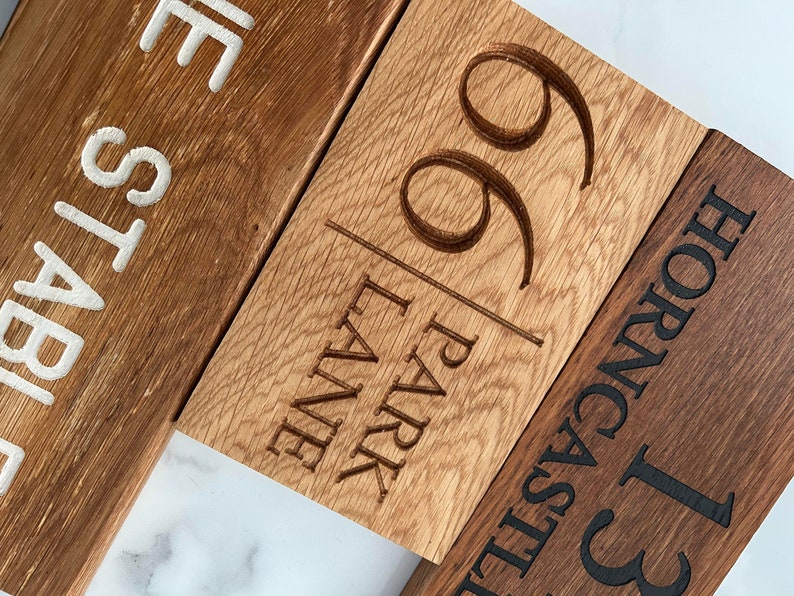Custom French oak sign with engraved text, ideal for home decor or as a thoughtful gift. Beautifully handcrafted, this sign can be personalized with your choice of words. Durable, rustic, and timeless in design, perfect for any space."