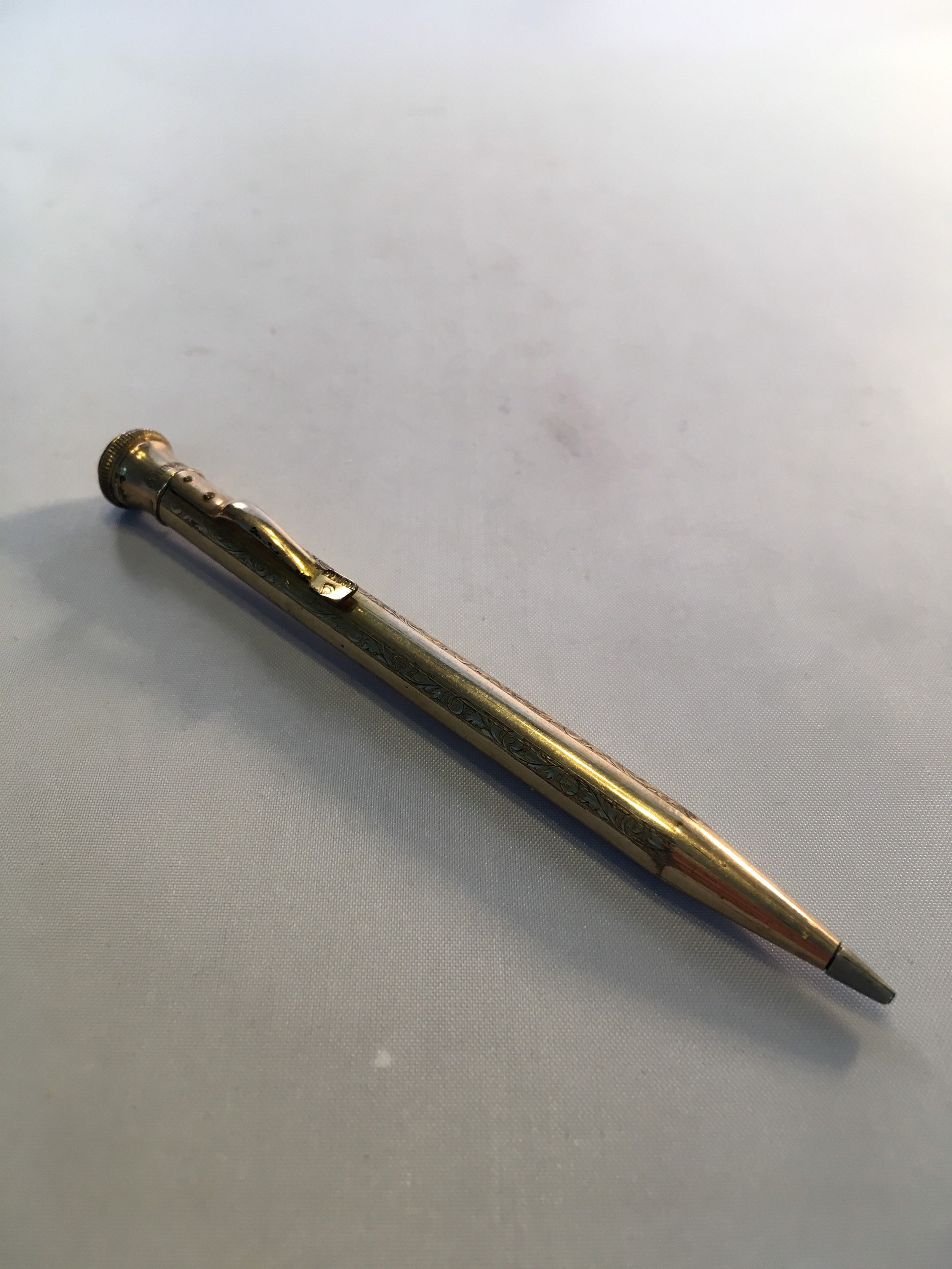 gold propelling pencil