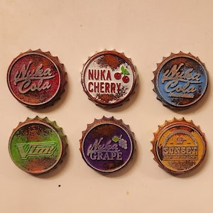 Nuka Cola Bottle Cap Magnet Set for Fallout Fans and Cosplayers 6 Pieces of Post Apocalyptic Themed Magnetic Bottle Caps from the Wasteland