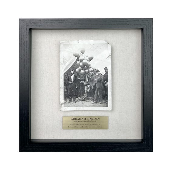 Parody of Abraham Lincoln with Balloons  / Framed Artifact for Wall