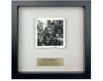 Parody of Amelia Earhart at Island Party  / Framed Artifact for Wall