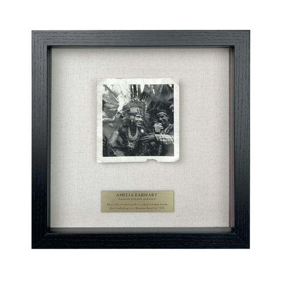 Parody of Amelia Earhart at Island Party  / Framed Artifact for Wall