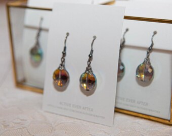 Boucles d'oreilles scintillantes de minuit