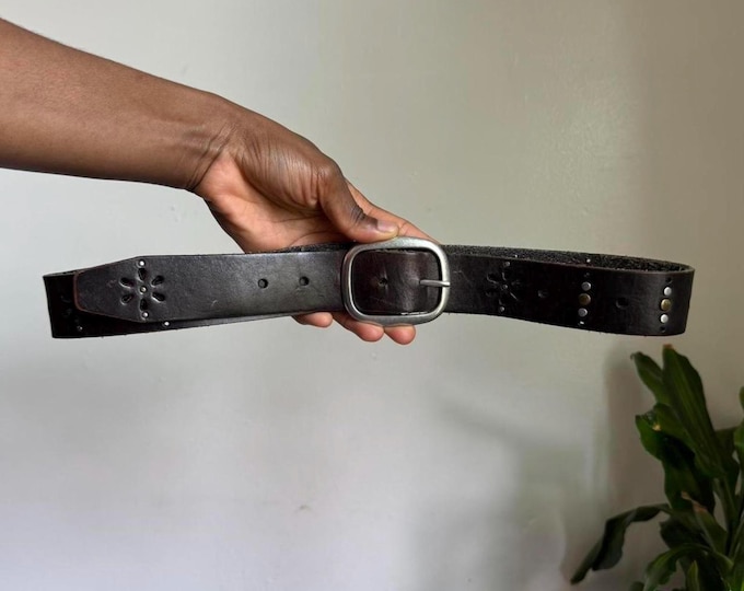 Vintage boho grunge leather belt with studded flower details and silver buckle