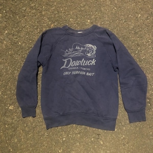 May include: Navy blue sweatshirt with the text "Dowluck OSAKA-TOKYO ONLY SURFACE BAIT" in a light grey color. The sweatshirt has long sleeves and a crew neck.