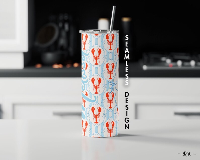May include: A stainless steel tumbler with a seamless design featuring red lobsters on a light blue and white striped background. The tumbler includes a silver straw and a silver lid. The design is repeated around the entire tumbler.