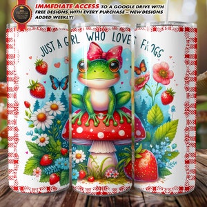 May include: A white tumbler with a red and white checkered border. The tumbler features a cartoon frog wearing a red bow on a mushroom with the text "Just a girl who loves frogs".