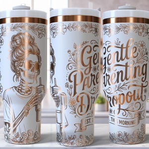 May include: White tumbler with a rose gold skeleton graphic wearing sunglasses and holding a beverage. The tumbler also features rose gold floral accents and the text "Gentle Parenting Dropout" with the words "Est. 1th Morning".