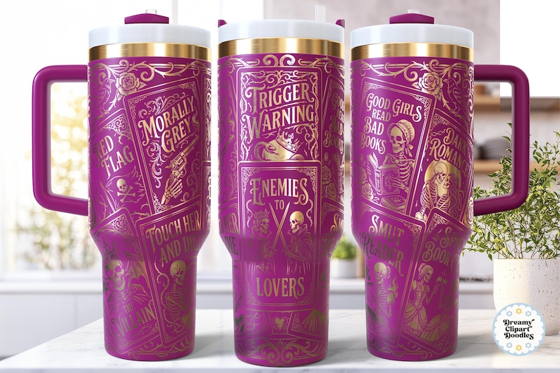 May include: Three purple travel mugs with gold accents and handles. Each mug features a unique design with text and illustrations, including phrases like "Trigger Warning" and "Good Girls Read Bad Books."