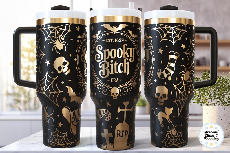 May include: Black and gold Halloween-themed tumbler with a white lid and black handle. The tumbler features spiderwebs, bats, skulls, and the text "Spooky Bitch - ERA". A spooky and fun accessory for Halloween.