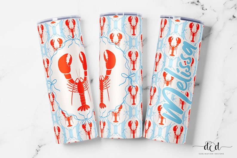 May include: Three white insulated tumblers with a red lobster pattern and blue accents. One tumbler has the name "Melissa" in light blue script. The design includes red lobsters, blue bows, and vertical blue stripes.