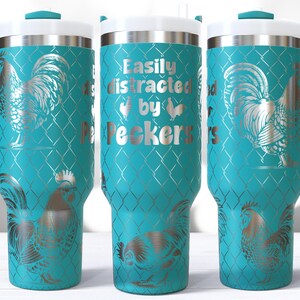 May include: Three teal travel mugs with white lids and teal handles. The mugs feature a silver rooster design and the text "Easily distracted by Pecker's". The mugs have a diamond pattern background.