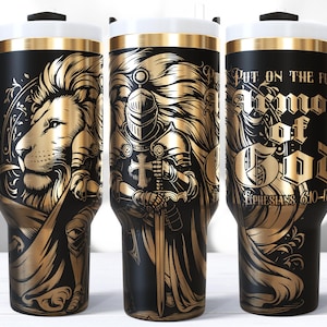 May include: Three stainless steel tumblers with black handles and gold accents. The tumblers feature a lion, a knight, and a quote from Ephesians 6:10-17. The quote reads "Put on the full armor of God".