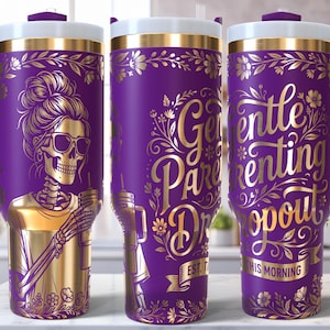 May include: A purple tumbler with a gold skeleton design wearing sunglasses and holding a drink. The tumbler has a white lid and a purple handle. The text "Gentle Parenting Dropout" is displayed in gold.