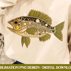 May include: A gold and green fish with a beaded design. The fish is on a white background.