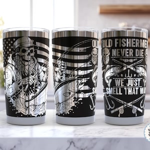 May include: Three stainless steel tumblers with black and silver fishing designs. One features a skeleton fisherman with an American flag background. The other two have text that reads "OLD FISHERMEN NEVER DIE, WE JUST SMELL THAT WAY."