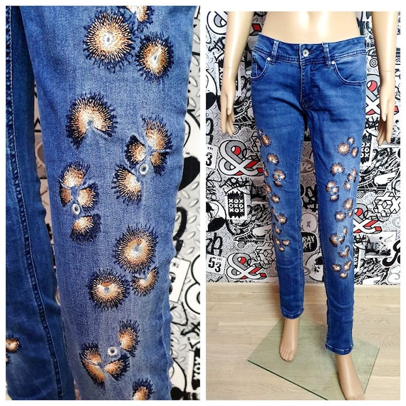 Embroidered denim jeans girl