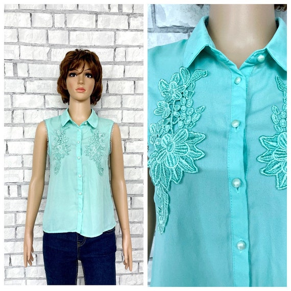 mint green blouse