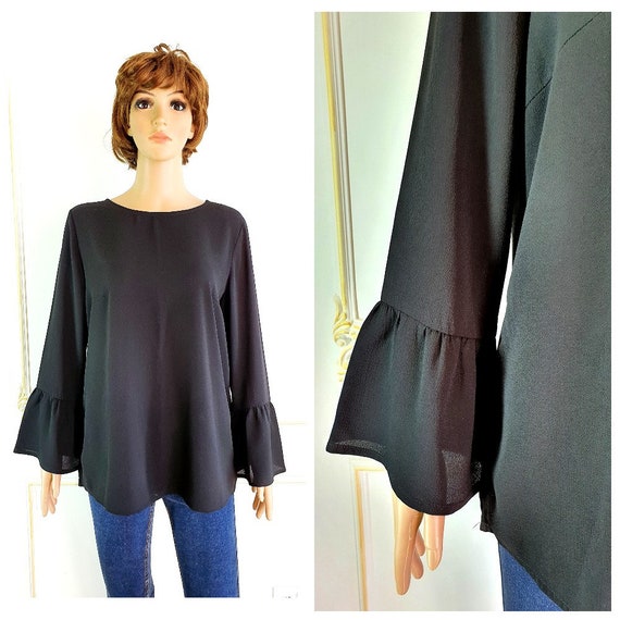 blusa negra manga campana