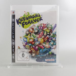 May include: A PlayStation 3 video game case with a colorful image of the game Katamari Forever. The game features a large, round, green ball with a smiling face and the words "Katamari Forever" written in white letters. The case is in a clear plastic protector.