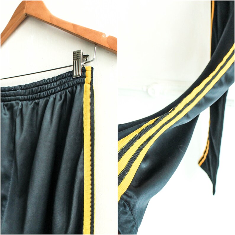 yellow track pants with black stripe