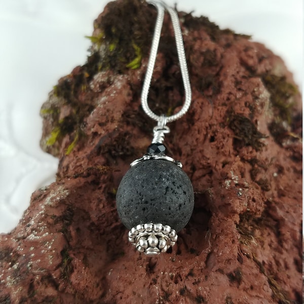 Lava Stone Necklace with Tibetan Silver and Black Glass Bead - 14mm Lava Stone