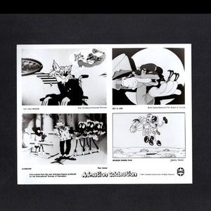 May include: Four black and white cartoon stills from the animated film "Animation Celebration". The stills are titled "Cat and Mouse", "Get a Job", "Sunbeam", and "Broken Down Film".