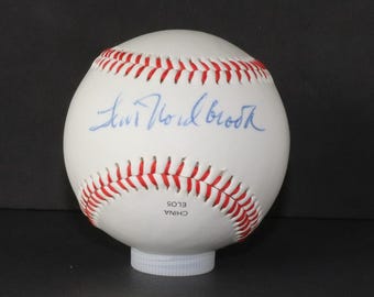 Autographed Baseball by Tim Norbrook, Who Indirectly Helped the Yankees Build Their 1977 and 1978 World Series Teams, with COA