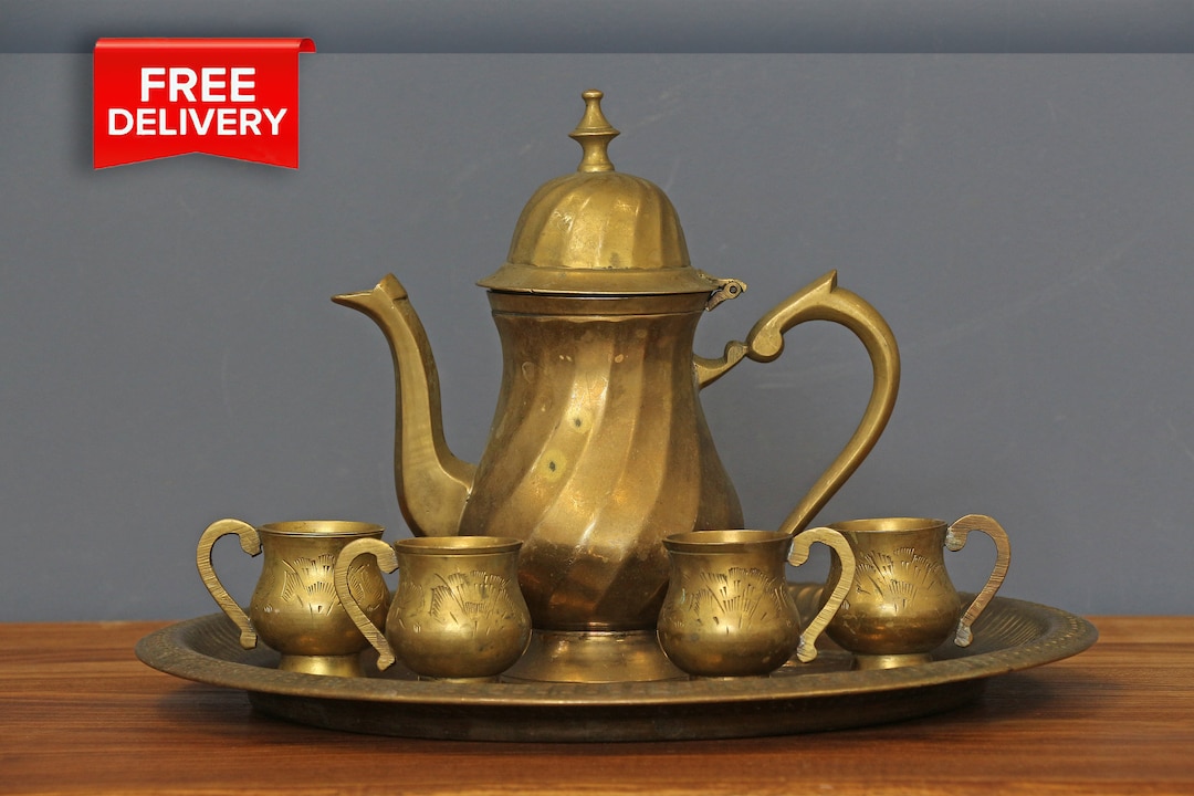 New Addition in Our antique collection Beautiful brass teapot,sugarpot and  creamer In good condition Handengraved