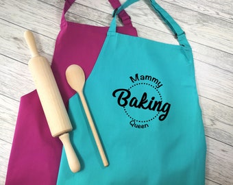 Personalised adult baking queen apron in raspberry or duck egg blue with choice of coloured detail