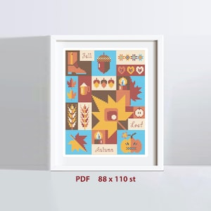 May include: A cross-stitch pattern featuring a colorful autumn-themed design with pumpkins, acorns, leaves, and the words "Fall", "Autumn", and "Leaf". The pattern is 88 stitches wide by 110 stitches tall.