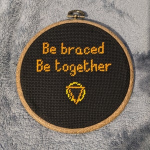 Digital Download pdf of Enter Shikari Lyric 'Be braced, be together' Cross Stitch with symbol.