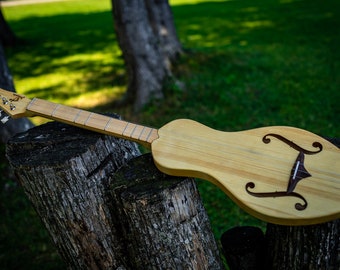 the Boondocker Maple + Spruce "Walking Dulcimer" 4 string Musical String Instrument. Small, lightweight, great for travel. Anyone can play!