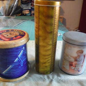 Three tin storage cans