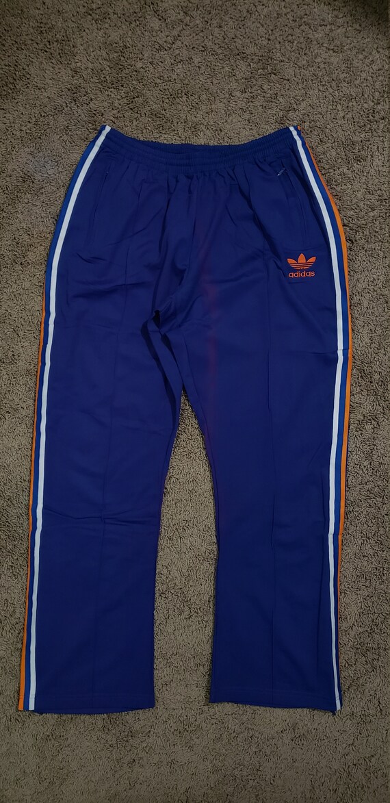blue and orange adidas pants