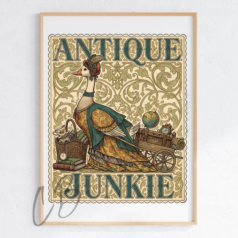 May include: A framed print featuring a whimsical illustration of a goose dressed in antique attire. The goose stands beside a cart filled with vintage items, with the words "ANTIQUE JUNKIE" displayed above and below the goose in a decorative font. The background has a floral pattern.