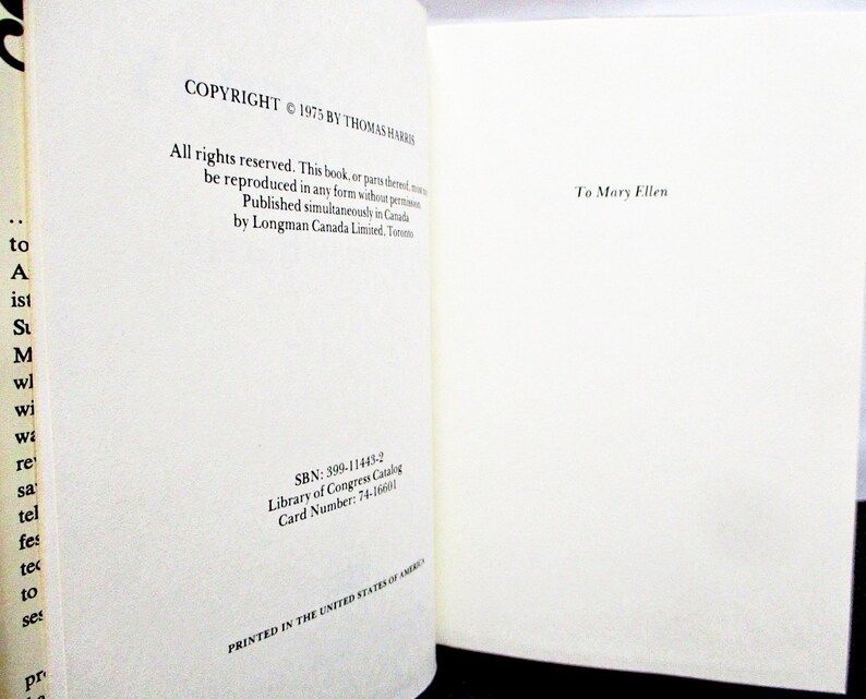 May include: Open book pages with text. The left page reads "COPYRIGHT &copy; 1975 BY THOMAS HARRIS" and other copyright information. The right page is dedicated "To Mary Ellen". The book is printed in the United States of America.