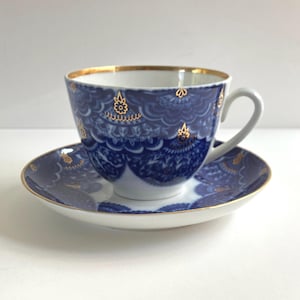 Vintage Imperial Lomonosov cobalt blue teacup and saucer with gold accents, made in Russia