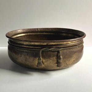 Large vintage hammered copper accent bowl / rustic planter with tassels
