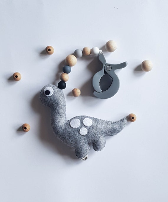 dinosaur pram toy