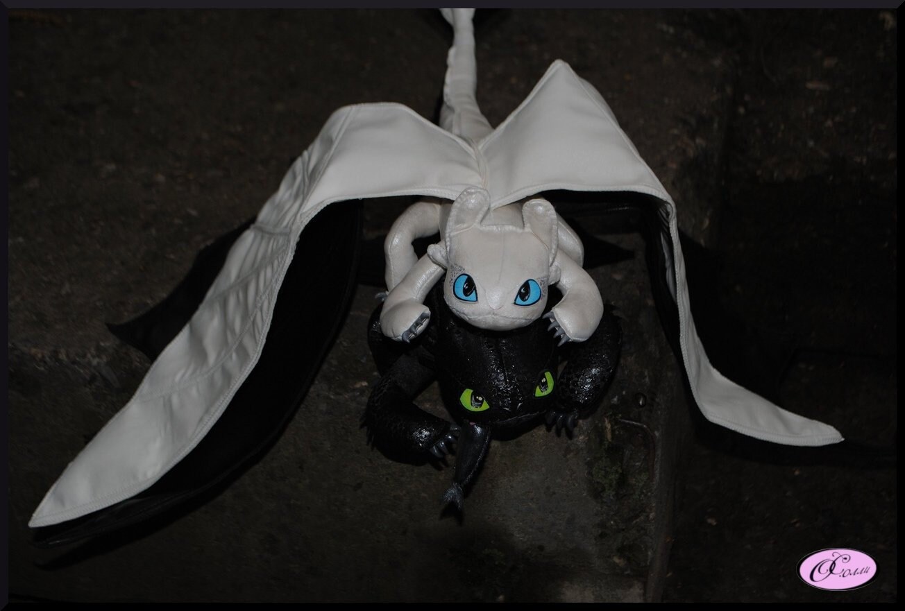 white toothless toy