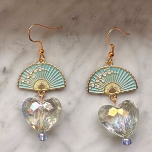Dainty cherry blossom fan handmade hypoallergenic opalescent heart dangle drop teal earrings earring set trending jewelry